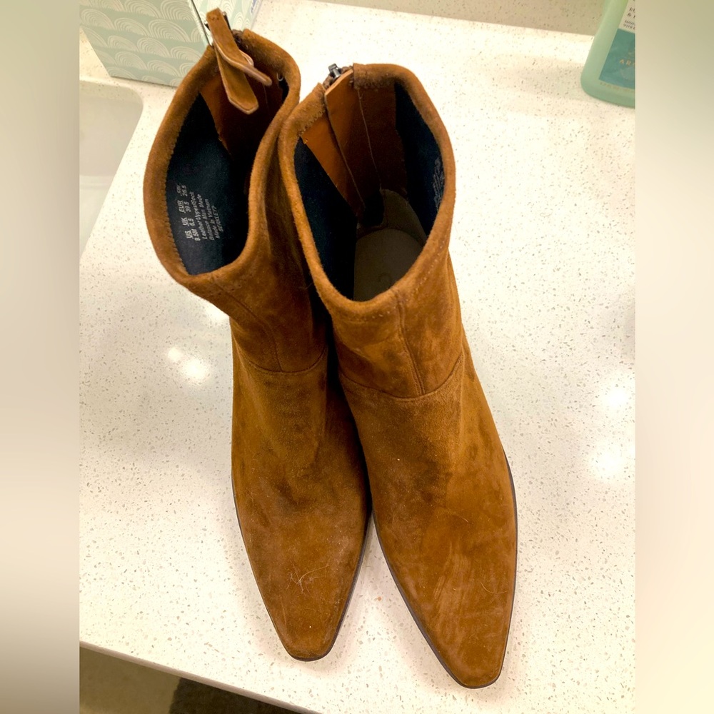 Brown suede boots with tasseled back zipper